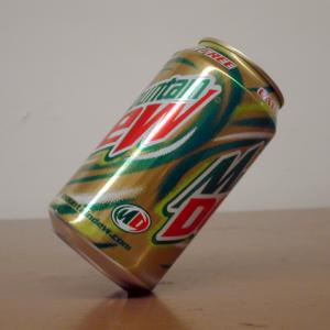 Take a soda can with no dents and add approximately 165 ml of water.  You should be able to balance the can on the beveled lower edge with this amount.  Add or subtract water as necessary for cans from different manufacturers.