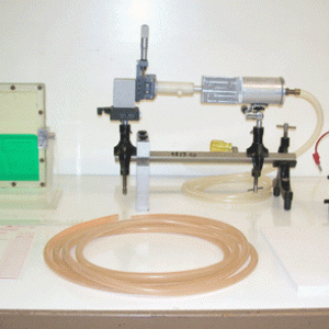 Attach the Tygon hose to the compressed air in the classroom.  Hold it at least 18 inches away from the end and turn on the air full blast.  The end of the hose will show a chaotic movement. The paper sheet or flag, bell on the battery, Rayleigh-Taylor demo, and the edge tone demo are all examples of types of instabilities under the right conditions.