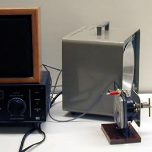 Set the microwave receiver pointing in the same direction as the transmitter and move just far enough in front of the transmitter to get a faint signal.  As the mirror is moved closer and farther away from the transmitter a beat frequency should be observed that is proportional to the speed of the mirror.