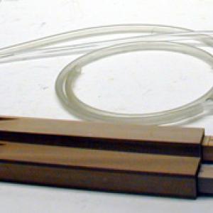 Take the two matched organ pipes and set them to the same frequency. Using a gentle air flow, change the plunger distance in one of the tubes and listen to the beats. The whistles are used exactly like the organ pipes described above.   