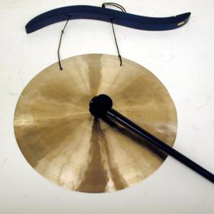 Attach the gong to a support rod on a table so that it hangs evenly from both strings.  Strike sharply with the mallet.  
