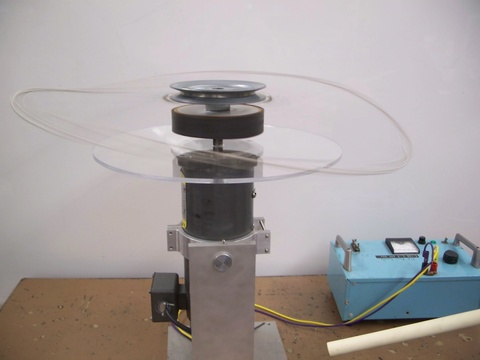 Dynabrolly apparatus, power supply on a table in use