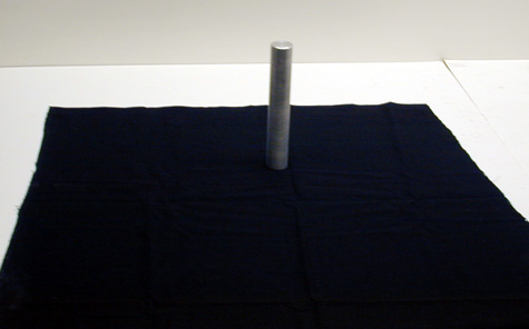cylinder on a black tablecloth