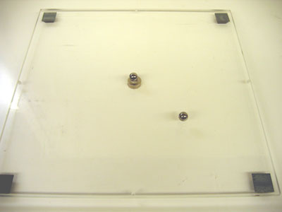 Overhead plate with ball bearings.