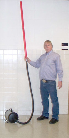 Dale Stille with leaf blower and tube attachment
