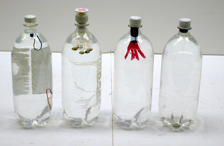 Plastic Bottles with Water and Divers 