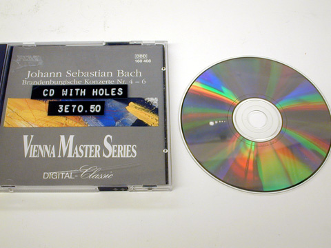 CD with holes of increasing size