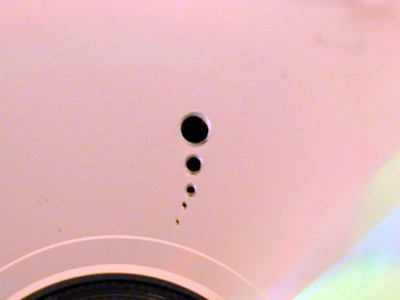 CD with holes of increasing size