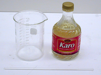 Karo Syrup and Beaker