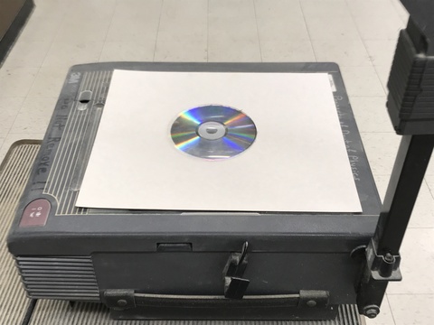 CD on Overhead Projector